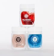 Three supplement bottles of Homegrown Primal Iron Stack, including Blood+, Thrive, and Bone + Marrow, displayed against a white background with a grass-fed beef logo."
"Close-up of Homegrown Primal Blood+ supplement bottle, labeled as a grass-fed beef blood supplement rich in heme iron and vitamin B12."